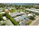 Stunning aerial view of a community with beautiful landscaping and a sparkling swimming pool near the intercoastal at 1753 Dawn St # 305, Sarasota, FL 34231