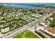 Scenic aerial shot showcasing a community near the intercoastal, landscaped grounds, and a sparkling pool at 1753 Dawn St # 305, Sarasota, FL 34231
