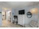 Bedroom with light fixtures, desk area, and en suite bathroom with vanity area at 1753 Dawn St # 305, Sarasota, FL 34231