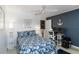 Charming bedroom with a nautical theme, study space, and natural light at 1753 Dawn St # 305, Sarasota, FL 34231