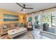 Comfortable living room with access to an outdoor deck and pool at 1753 Dawn St # 305, Sarasota, FL 34231