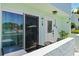 Private patio featuring outdoor seating and sliding door access to the condo at 1753 Dawn St # 305, Sarasota, FL 34231