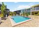The community pool features a large pool and a beautifully landscaped sun deck at 1753 Dawn St # 305, Sarasota, FL 34231