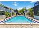Inviting community pool offering residents a place to cool off and enjoy the outdoors on a sunny day at 1753 Dawn St # 305, Sarasota, FL 34231