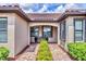 Charming front entrance with brick pathway and manicured landscaping at 17648 Northwood Pl, Lakewood Ranch, FL 34202