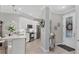 Bright, open kitchen with stainless steel appliances, white cabinets, and tiled backsplash at 17648 Northwood Pl, Lakewood Ranch, FL 34202