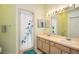 Bathroom features double sinks and custom tile on shower at 1801 Highland Rd, Osprey, FL 34229