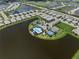 Aerial view of the community pool, tennis courts and surrounding waterway at 18039 Cherished Loop, Bradenton, FL 34211
