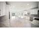 Open-concept living area that showcases the gourmet kitchen with a large island at 18039 Cherished Loop, Bradenton, FL 34211