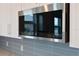 Stainless steel microwave with built-in settings that compliments the sleek kitchen design at 18039 Cherished Loop, Bradenton, FL 34211