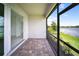 This covered patio features beautiful brick pavers and stunning views of the water at 18039 Cherished Loop, Bradenton, FL 34211