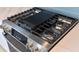 Stainless steel gas stove top features a griddle and easy to use controls at 18039 Cherished Loop, Bradenton, FL 34211