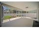 Covered patio offers shaded space and access to the backyard at 1881 Orchid St, Sarasota, FL 34239