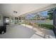 Covered patio offers shaded space and access to the backyard at 1881 Orchid St, Sarasota, FL 34239