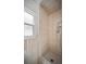 Shower featuring tiled walls and an adjustable shower head at 1881 Orchid St, Sarasota, FL 34239