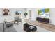 Cozy living room featuring hardwood floors, TV, modern furniture, and large windows at 1914 Cobb Trl, Parrish, FL 34219