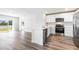Modern kitchen featuring stainless steel appliances, granite countertops, and white cabinets plus island at 1922 Cobb Trl, Parrish, FL 34219