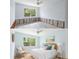 Split image showing before and after of newly remodeled bedroom with blue walls and minimalist design at 2115 9Th W Ave # 3D, Bradenton, FL 34205