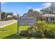 Creekview Condominium community sign in well manicured lawn with street view at 2115 9Th W Ave # 3D, Bradenton, FL 34205