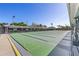 Outdoor shuffleboard courts, painted in green and grey, are ready for a day of play at 2115 9Th W Ave # 3D, Bradenton, FL 34205