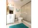 Bathroom featuring a vanity with a mirror, toilet, and a shower with sliding glass doors at 21405 Olean Blvd # 224, Port Charlotte, FL 33952