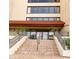 Exterior shot of a condominium complex showing the stairs leading to the main entrance at 21405 Olean Blvd # 224, Port Charlotte, FL 33952