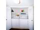 Convenient laundry closet features a stacked washer and dryer, maximizing space and efficiency at 21405 Olean Blvd # 224, Port Charlotte, FL 33952