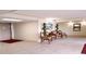 Condominium lobby with elegant seating arrangement and tile floors at 21405 Olean Blvd # 224, Port Charlotte, FL 33952
