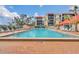 Sparkling pool provides a refreshing oasis, surrounded by lounge chairs for relaxation at 21405 Olean Blvd # 224, Port Charlotte, FL 33952