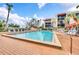 Sparkling pool provides a refreshing oasis, surrounded by lounge chairs for relaxation at 21405 Olean Blvd # 224, Port Charlotte, FL 33952