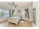 Cozy bedroom with a coastal design, lots of natural light, and wood-look flooring at 220 39Th Ne St, Bradenton, FL 34208