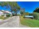 A view of the Riverpointe Community Park entrance, with lush landscaping and clear blue skies at 220 39Th Ne St, Bradenton, FL 34208