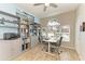Bright office space with an arch window, built in shelves and desk at 220 39Th Ne St, Bradenton, FL 34208