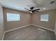 Bedroom with fan, neutral paint and trim, and dual-windows for natural light at 2629 14Th S Ave, St Petersburg, FL 33712