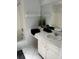 Bright bathroom featuring a white vanity and a shower-tub combination at 3262 Brunswick Ln # 707, Sarasota, FL 34239