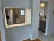 Bright kitchen featuring stainless steel appliances and a pass-through window at 3262 Brunswick Ln # 707, Sarasota, FL 34239