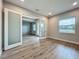 Office features wood-look floors and glass French doors at 3512 Cross Creek Pkwy, Parrish, FL 34219