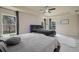 Bright bedroom with multiple beds, white walls, and a ceiling fan provides lots of space at 3524 Brownwood Ter, North Port, FL 34286