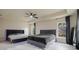 Spacious bedroom featuring two beds, modern lighting, and neutral accents at 3524 Brownwood Ter, North Port, FL 34286