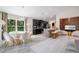 Open-concept design seamlessly connects the kitchen, dining, and living areas, creating an inviting space at 3524 Brownwood Ter, North Port, FL 34286
