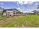 Exterior shot of the barn and home on the property at 39700 State Road 70 E, Myakka City, FL 34251