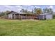 Exterior view of barn and outbuildings on the property at 39700 State Road 70 E, Myakka City, FL 34251