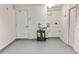 Finished basement area with a water heater at 4112 Cochise Ter, Sarasota, FL 34233