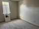 An airy bedroom with tile flooring and a set of white shutters by the window at 4122 N Lockwood Ridge Rd, Sarasota, FL 34234