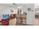 Cozy dining area with bar seating and a view of the living room, perfect for casual meals and entertaining at 4153 66Th Street W Cir # 4153, Bradenton, FL 34209