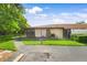 Charming single-story home features a well-maintained lawn and inviting entrance at 4153 66Th Street W Cir # 4153, Bradenton, FL 34209
