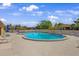 Relaxing community pool with lounge chairs and beautiful landscaping at 4153 66Th Street W Cir # 4153, Bradenton, FL 34209