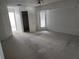 Spacious bedroom featuring neutral walls, carpeted floors, and a closet, offering a blank canvas to make it your own at 4354 Rock Creek Dr, Port Charlotte, FL 33948