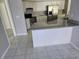 Kitchen featuring granite countertops, stainless steel appliances, and tile flooring at 4354 Rock Creek Dr, Port Charlotte, FL 33948