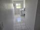 Bright laundry room with a washer, dryer, and utility sink at 4354 Rock Creek Dr, Port Charlotte, FL 33948